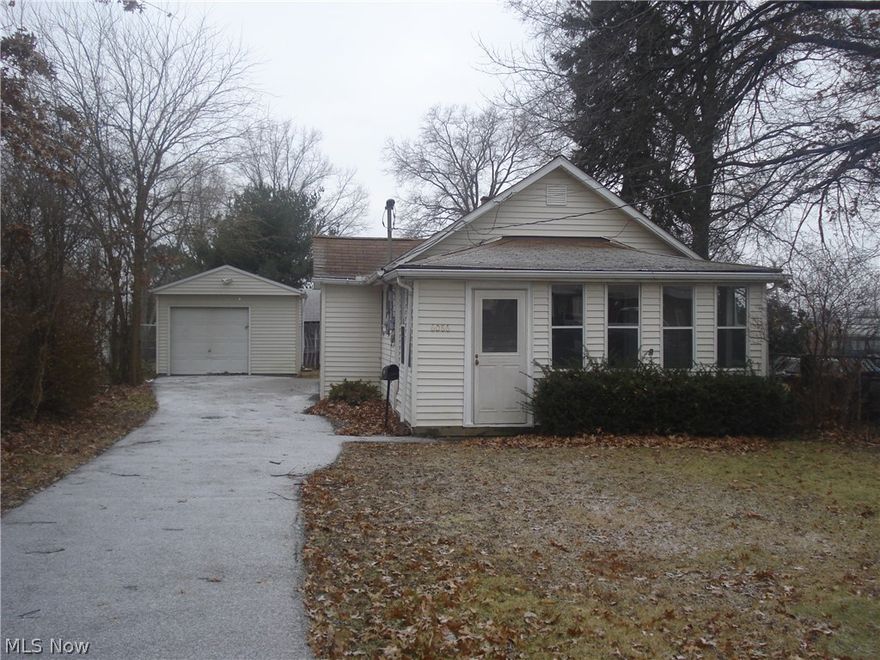 Great Investment Property! Would make a terrific rental! 2 Bedrm, 1 bath, huge enclosed front porch, garage.