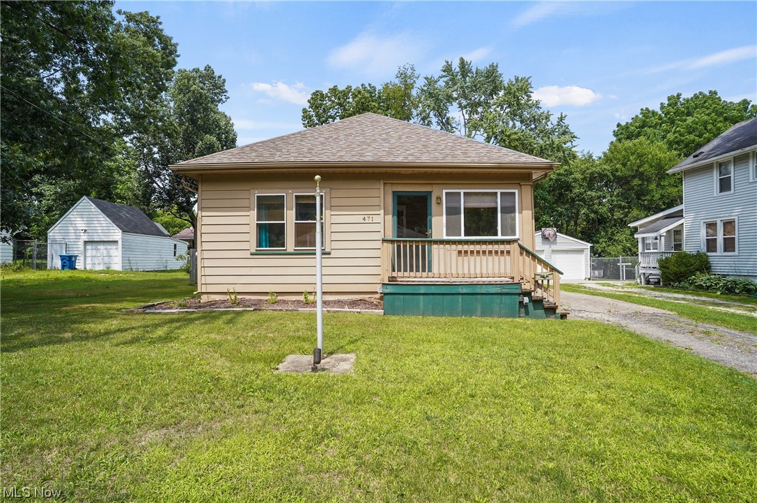471 Stinaff St Kent, OH 44240 is a gorgeous fully remodeled RANCH home with front sunroom entry & rear mudroom entry, fully fenced in backyard w/ 6ft privacy fence & 2 gates installed in 2017. New roof installed home & garage in 2016 followed up w/ bathroom remodel ceramic porcelain tile, new shower bath full surround, LED lighting w/ touch control on mirror, new vanity, elongated commode, awesome flooring & deco paint w/ accents, are just some of the highlights. New high efficient furnace added in 2018; older but goodie central air conditioning system. 2021 remodel of kitchen included quartz countertops, luxury vinyl tile, SS sink, faucet, painted cabinets, new hardware, new vent for stove which, like all updated kitchen appliances are stainless steel about 5 years old. Electric panel installed, enclosed sunroom & mudroom added along w/ GFCIs, plumbing, Sewer lines. LVT flooring installed throughout entire living spaces including bedrooms, hall & dining room, living room & entire int