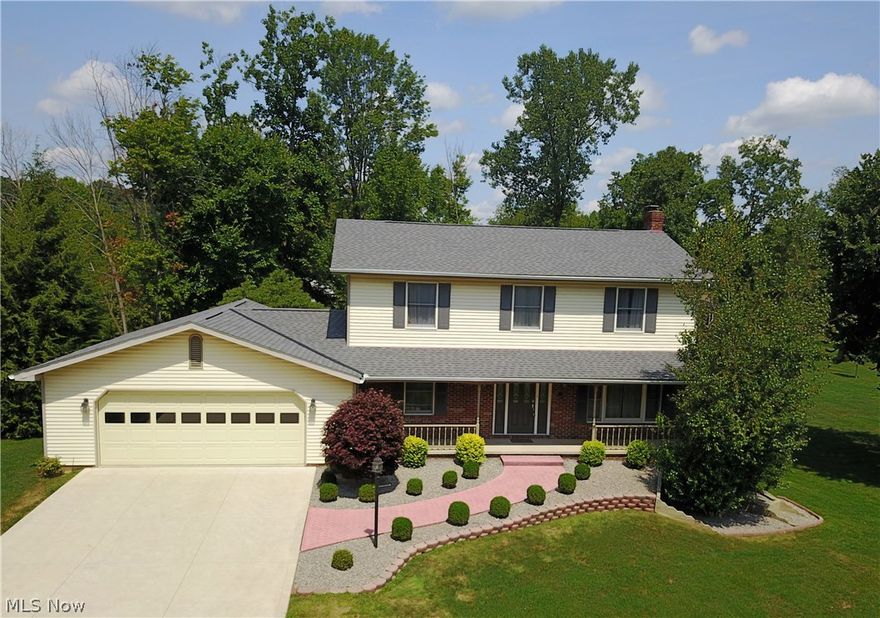 This custom designed, captivating .54 acre home has the character & charm you’ve been searching for! With recent updates & designer choices, this home has the look that today's buyer & market will appreciate. The beautiful, open kitchen offers full tile back splash, stainless steel Electrolux appliances, pantry, DuraCeramic flooring & dinette. Even more impressive is the sunken great room that offers hardwood floors, crown molding, built-in bookshelves & a grand brick gas fireplace as the focal point. The sunroom invites you in with views of beautiful tree lines & the expansive back deck that overlooks the spacious yard. The mud room & ½ BA are also situated on the 1st fl. Located on the 2nd fl is the remarkable and alluring master BR with adjoining en suite. Beautiful & roomy master BR features plush carpet, ceiling fan, walk-in closet & pocket door to the private BA. The newer master BA offers marble counter tops & marble stand up shower & an impressive 11x8 walk in closet. The addit