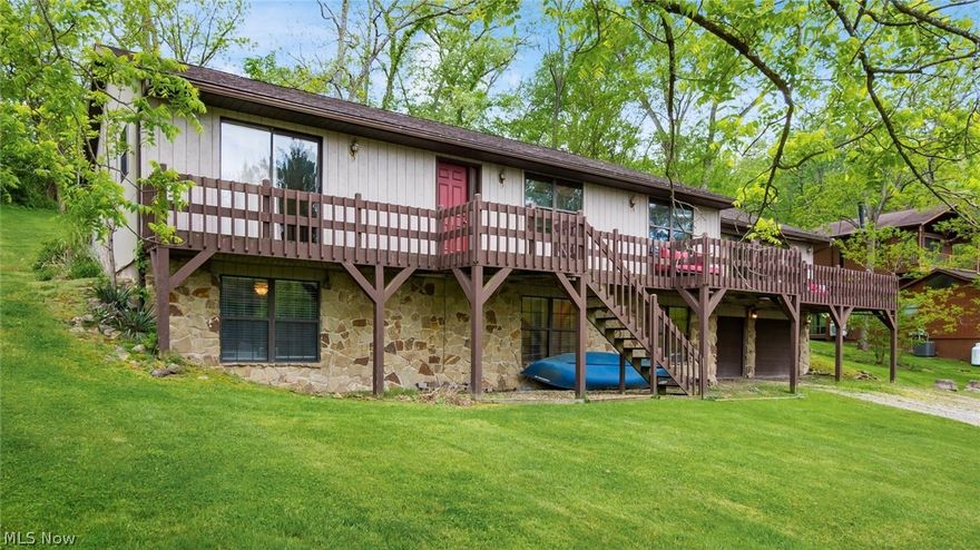 MORE PHOTOS TO COME SOON !!
Experience lake living at its finest with this inviting waterfront retreat offering direct lake access and a private dock—perfect for boating, fishing, swimming, or simply unwinding by the water. Whether it’s a quiet morning with coffee on the deck or a lively summer gathering, this home is designed to capture the beauty and enjoyment of lakeside living.
The expansive deck showcases sweeping lake views and provides an ideal space for entertaining or relaxing while taking in the peaceful surroundings. Just minutes away, you’ll find convenient access to local dining, shopping, and recreational amenities, including a nearby state park with beach access and walking paths for outdoor enjoyment.
Set within a welcoming and friendly community, this property offers not just a home, but a lifestyle. Neighbors become friends, and every season brings new opportunities to create lasting memories—from summer days on the water to cozy evenings with loved ones.
A rare opportunity to own a home where comfort, convenience, and scenic beauty come together seamlessly.
MWCD lease rental only $2350 ANNUALLY !
