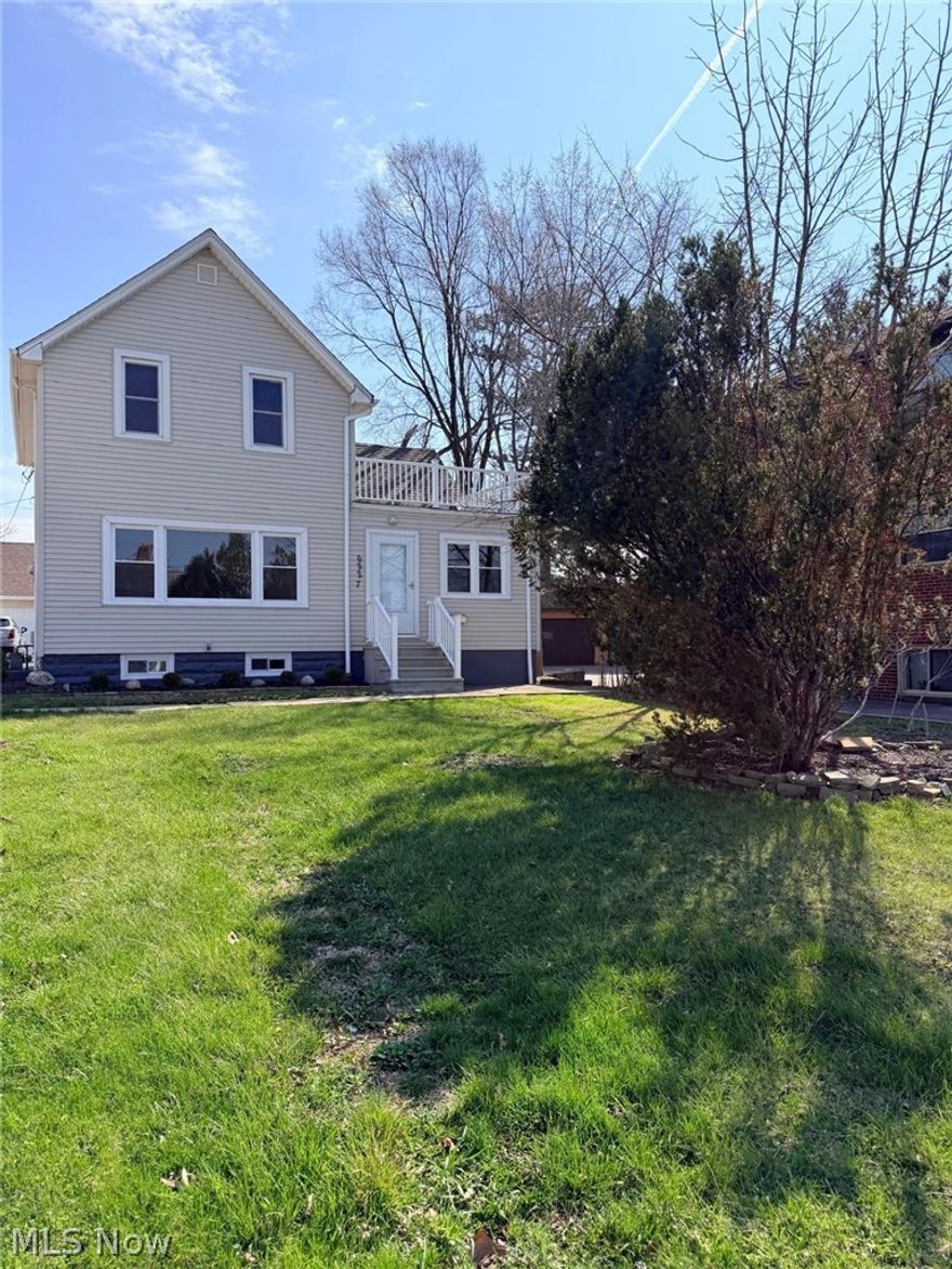 COMPLETELY RENOVATED and updated home in great Parma location! This masterfully updated home is better than new construction! With quality materials and workmanship throughout, this home is sure to please! BRAND NEW EVERYTHING! New flooring, fixtures, driveway, kitchen, bathrooms, furnace, HWT, etc. No detail has been spared! The first floor boasts a stunning kitchen with new stainless appliances, marble-style granite counters, ceramic flooring AND a walk-in pantry adjacent to kitchen for storing all those kitchen gadgets and pantry staples! The first floor also features a fully renovated bath, laundry room equipped for either gas or electric dryer, and an open concept living/dining/foyer area! The room sizes are HUGE! A main-floor bedroom adds convenience and flexibility! In the upper level, you will find 3 enormous bedrooms. One side features a uniquely designed master suite with a private full bath and your own walk-out balcony for peaceful evenings or sunny mornings. On the other side, there are3 additional rooms that are tandem - a bedroom with vanity nook and dual closets, a versatile middle space (office, nursery, or walk-in closet, and a final 3rd private room! The home sits 70+ feet off the road offering privacy! The new driveway leads to an oversized 3 car garage with a loft that can be transformed into a hobby room, studio, or office. Located near highways and shopping, this home is the perfect blend of comfort, style, and convenience. All updates are in the supplements! Call for your appointment today, fall in love, and bring your offer!