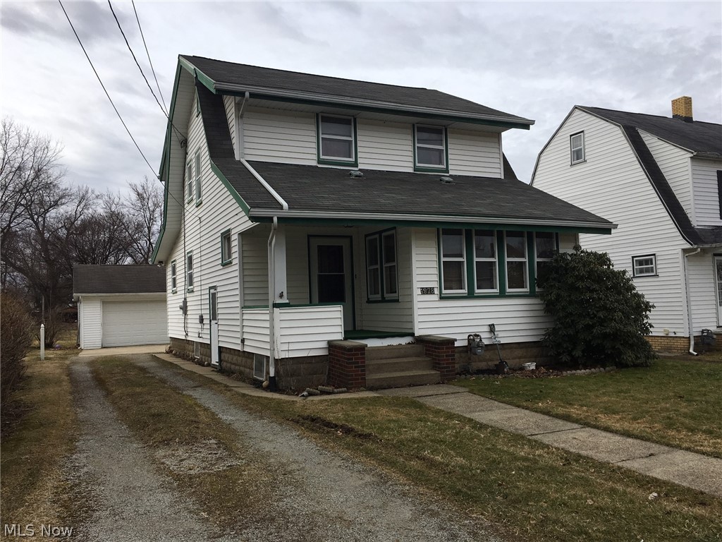 Charming, spacious home in the heart of East Sparta! The first thing you will notice is how well maintained the home is & the massive garage. The 2+ car garage was just added in 2011. There is a beautiful deck that wraps around the back of the house, from the kitchen to the dining room sliders. Into the kitchen, you will be impressed by the size & amount of counter space. There is a nice little table that folds out to have your coffee & folds down, if you need more space. The archway nook is just right for the refrigerator & there is also a large pantry. Into the bright beautiful, formal dining room, featuring new laminate floors, built ins with a seating area & new sliders (with built-in blinds) out to the deck. The living room is carpeted and highlights the original woodworking & opens to the sunroom/bonus room at the front of the home. There is a full bath with a brand new shower on the main level as well! On the way to the second level there is a coat closet at the landin