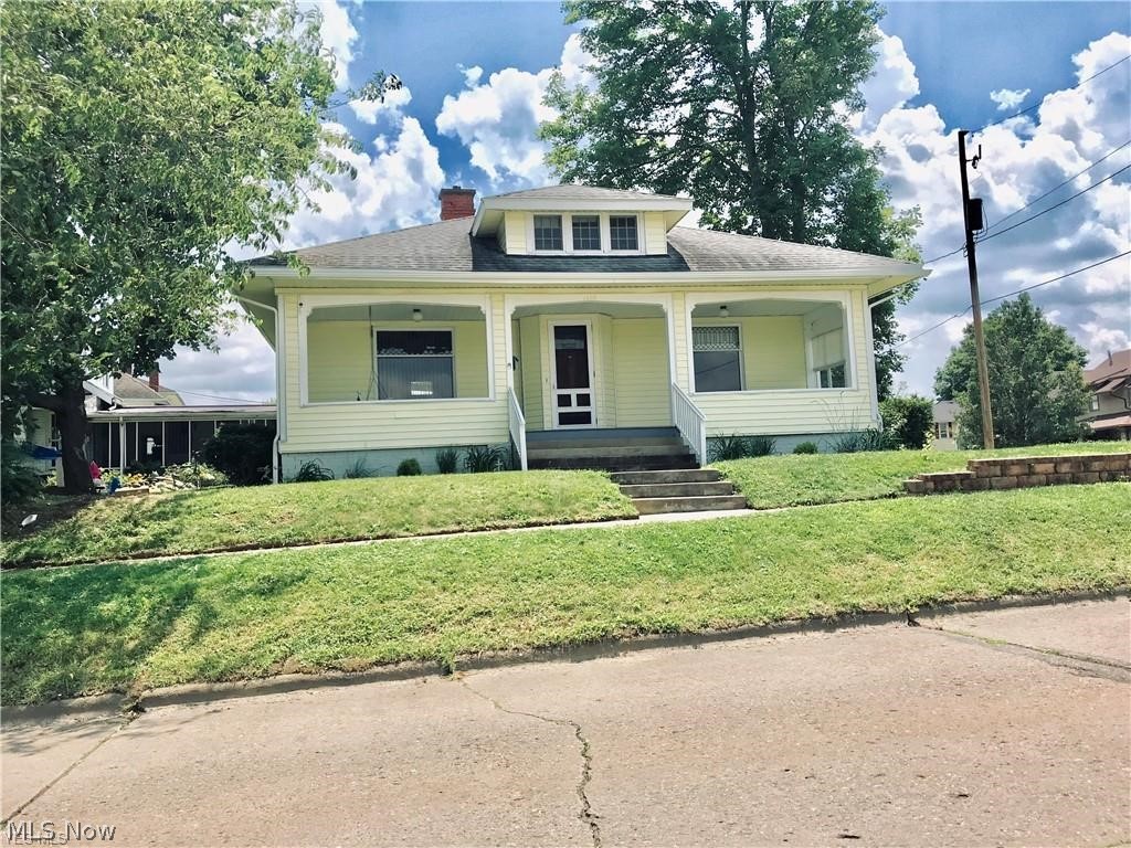 Adorable 1 1/2 story bungalow w/Lots of character & charm, beautiful hardwood floors, crown molding, beveled glass windows, oak trim & solid oak doors, cozy wood burning fireplace in liv rm, large country kitchen, many built-Ins, first floor stackable laundry area near steps to private upstairs bedroom & bath, new seamless gutters, newer roof, updated furnace & electric box. Attached carport, corner lot, shared drive. Great location near city park, public swimming pool, schools, & hospital. Must see inside! Tenant pays all utilities & is responsible for lawn care. Tenant must pass background & credit check.