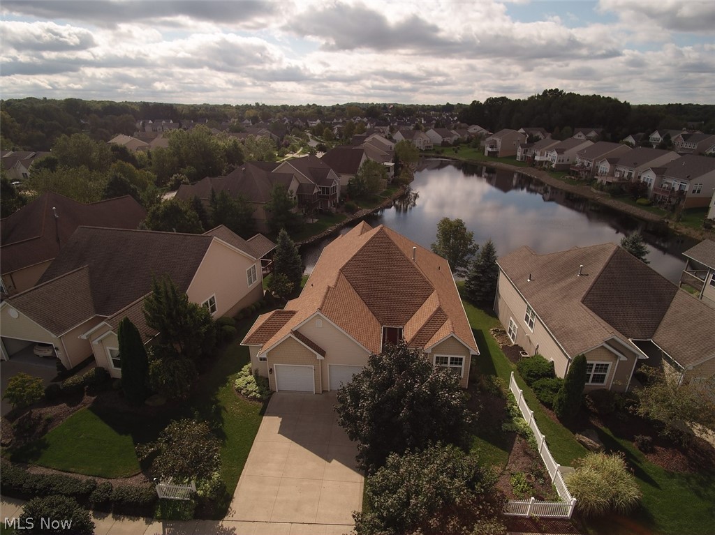 Absolutely beautiful stunning lake views from this stand alone, single family ranch home w/ walkout lower level in The Lakes At Franklin Mills w/ open concept for great views of the lake! Freshly painted, updates include gorgeous wide planked "hand-scraped" wood floors thru main floor living area & master bedroom; large rectangular tile architecturally laid thru eat-in kitchen & laundry room as well as artist rendered foyer tile. Master Bath remodeled with ADA compliant 6' tile & glass shower, multiple shower heads & grab bars, granite countertop w/ 2 under mount sinks & linen closet. Kitchen remodeled w/ counter height granite breakfast bar w/ plenty of seating, Moenstone under mount sink and stainless steel appliances: 5 burner gas stove/ oven, double door fridge w/ bottom freezer, over oven microwave, dishwasher w/ controls on top of door for clean look! 3 bedrooms on 1st floor w/ 2 full bathrooms: 1st floor master also overlooks the lake, other 2 bedrooms were used as an office & a