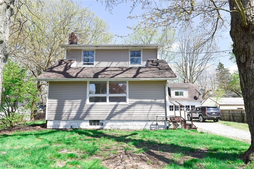 Unique opportunity to own 1300+ square foot three bedroom home sold together with 2571 Edwin which has an efficiency apartment/inlaw suite above the detached two car garage. Main home has been professionally painted with new/refurbished flooring througout. Updated kitchen with breakfast bar. Large living room with decorative fireplace and hard wood floors. Dining room with slider to side deck. Year round heated front sunroom. Updated 100 amp electrical panel. Newer vinyl siding. All on a double lot nearly a quarter acre! Apartment over garage offers large living room and one bedroom with full bath. Perfect for extra income or in-law suite. Great location near Nesmith Lake and highway access.