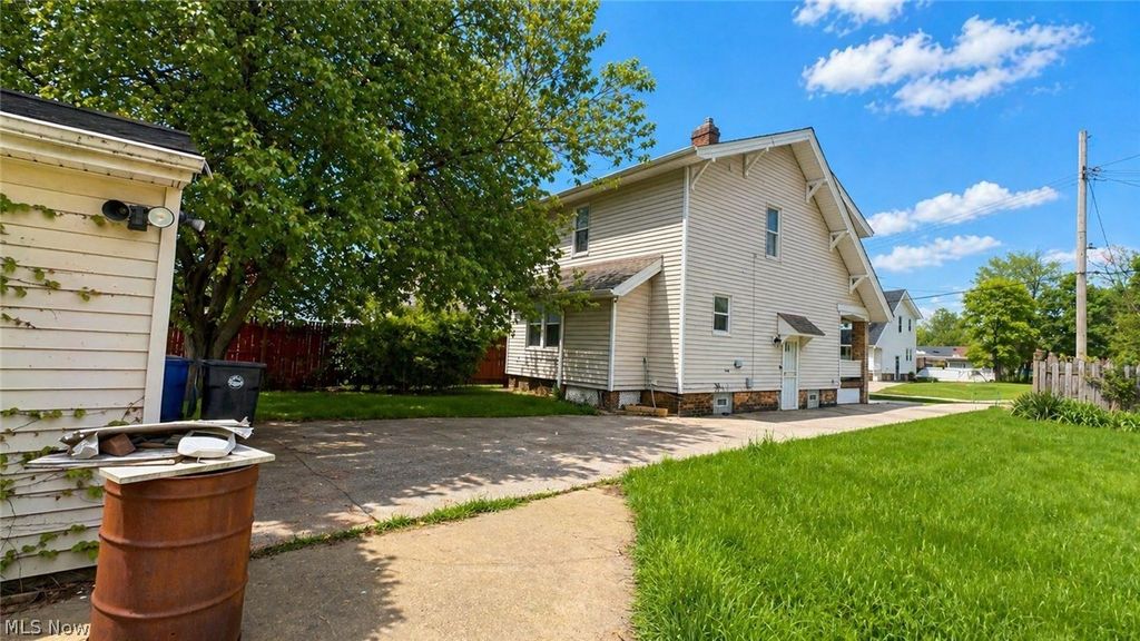 Photo of 15002 Upton Avenue, Cleveland, OH 44110 (MLS # 5205482)