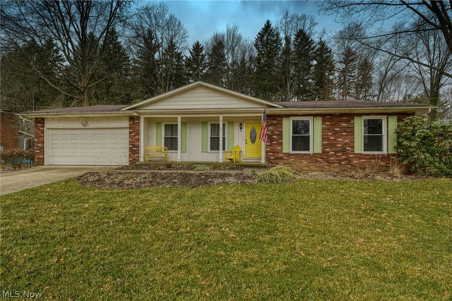 This charming 3 bedroom, 2 bath ranch is located in the Revere School District. All major mechanicals are newer, its been updated throughout and truly move in ready!  Large kitchen with ample counter/cabinet space with an eat in area.  Offers a walk in pantry, newer appliances, new vinyl flooring and opens to family room.  Family room features a brick wood burning fireplace with hearth and sliding doors onto a wood deck overlooking the fenced in backyard. Spacious living room has newer carpeting, large windows and plenty of room for family and friends. Nicely sized master bedroom has full updated bathroom and ample closet space. Remaining two bedrooms are nicely sized with newer carpeting, plenty of windows and closet space. Fully updated first bathroom with new vanity and tile surround tub/shower finish off the first floor. The finished lower level has a wet bar and is perfect for a play room, rec room or man cave! Large fenced in backyard with shed has enough space for all things out