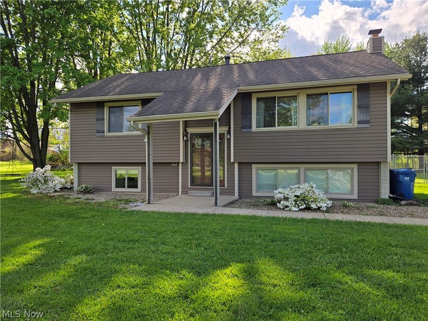 Location-Location! 4 bedroom, 2 bath bi-level situated on 1+ acre in Wellington. The back yard is partially fenced in and the deck will be stained when weather permits. Plenty of room to roam from front to back! Call your Realtor for a private tour.