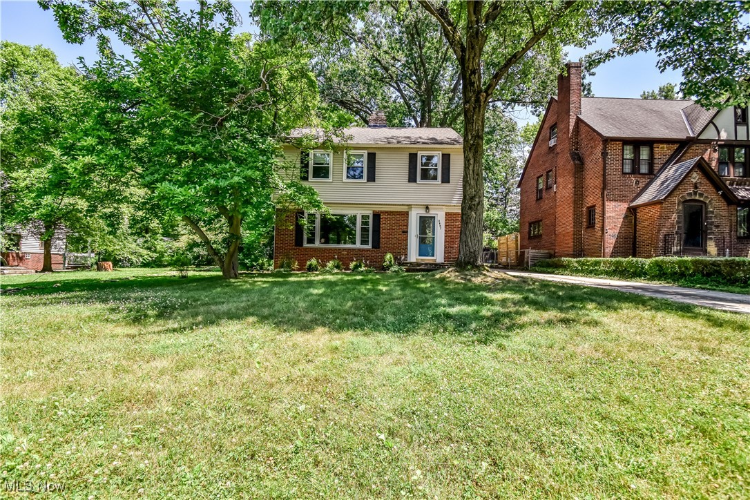 Beautiful Colonial on a mature street In University Heights. This three-bedroom two bath home is simply stunning. From its original hard wood floors to its amazing private back yard. There is a nice size all season room that would make a great office, playroom or craft room and still be close to all of the family. The back yard has a nice, shaded patio for summer picnics. The basement has a finished room for your home gym, or a family hang out. The furnace was replaced in 2019, the Air in 2018 and the windows in 2021. Ready to move in and enjoy. Come look at it before it's gone.