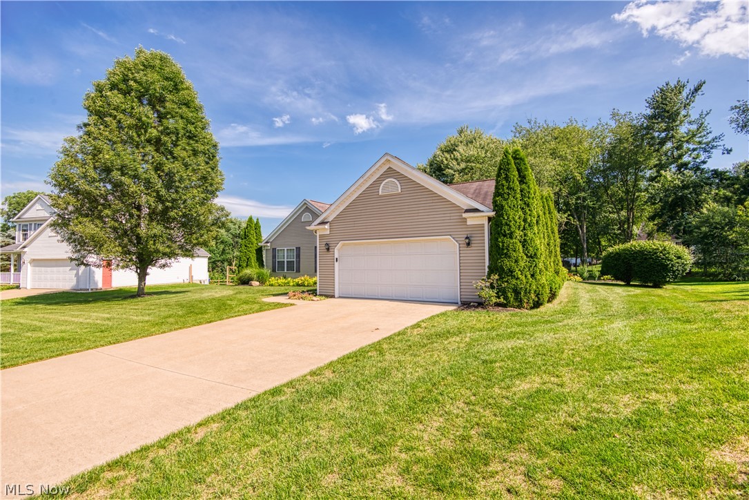 Don't miss this well laid out ranch home complete with first floor laundry, spacious primary bedroom with en suite bath, extra large walk in closet and a spacious backyard. This home boasts three well sized bedrooms with large closets and two full baths on the main floor. The basement is extra spacious with tall ceilings and has a half bath as well (basement is approx 1920 sq ft). This is a one owner home and has been VERY well cared for. The furnace is only 2 years old ad everything has been meticulously maintained. If you're looking for a move in ready spacious ranch, this is definitely one to see!