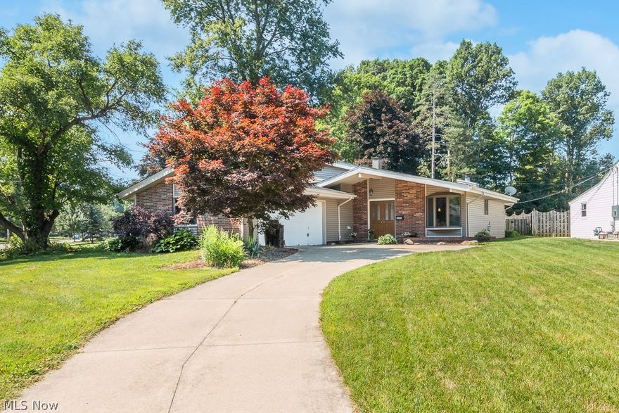 Must see this beautiful four bedroom, two full bath home located in Olmsted Falls School District.  Walk in to the front door to vaulted ceilings and an open floor plan.  Amazing kitchen that was updated in 2016 with granite counter tops, tile back splash and beautiful stainless steel appliances that all stay!  Spacious family room features a gorgeous wood burning fireplace, plenty of windows for natural light and sliding glass doors that lead out to the private deck with built in seating for 12. Fully fenced in backyard with six foot privacy fence.  Bathrooms updated in 2016 with vanities and ceramic flooring. All new carpet and fresh paint were updated in 2016.   Central air, furnace, drive and siding updated in 2007.  Recreation room on lower level offers extra living space.   All this in a wonderful development with pool, tennis, basketball and playground ($310/year).  Schedule your private showing of the gorgeous home today!