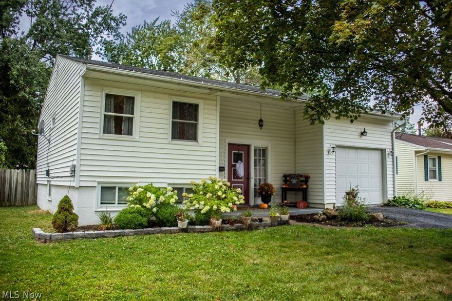 WOW! The one you have been waiting for! Welcome to 315 Boston Ave! This spacious 3 bedroom home has everything you are looking for! Great curb appeal with its vinyl siding, inviting front porch, and attached garage! Enter into an inviting foyer and step up to the beautiful great room that is open to the formal dining room, perfect for entertaining! Great kitchen featuring an abundance of cabinets and counter space, complete with stainless steel appliance package! Sliders to an awesome deck space overlooking the FENCED backyard! A Master suite and an updated bath complete with tiled shower completes the main level! On the next level there is even more space! 2 great bedrooms, a sitting area, updated half bath, and laundry room. Central Air new in 2020. This home has many updates and is in move in condition! Make an appointment today! It won't last!