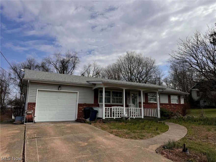 Lovingly maintained by its original owner, this charming ranch offers comfortable one-level living with room to spread out. The home features 3 bedrooms, including an extra-large primary suite with a private full bath and double closets. The bright living room flows into a spacious kitchen and dining area, along with a separate formal dining room—perfect for gatherings—with easy access to the back deck for indoor-outdoor entertaining.

The finished basement adds even more space with a large rec room ideal for relaxing or hosting, plus a storage room and access to a second garage/workshop—perfect for hobbies, tools, or extra parking.

Outside, enjoy the welcoming covered front porch, attached garage, and a nicely sized lot in a peaceful setting. A separate shed with electric provides additional workspace or storage, with bonus space above that could become a charming playhouse or creative retreat. Established flower beds with spring bulbs are ready to bloom, giving the next owner a great start for landscaping.