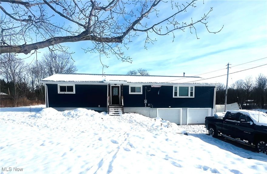 This Completely renovated home is situated on 3.6 acres in the desirable Huntsburg, Ohio. This move-in-ready property offers extensive updates inside and out, including a new metal roof, new windows, and an attached two-car garage. The beautifully updated kitchen features quality KraftMaid cabinetry and all new appliances. A large living room with a wood burner provides a warm and inviting space, perfect for entertaining. The home offers a spacious primary bedroom (Seller is also open to adding some walls to make another bedroom or two if buyer is interested) and updated living spaces throughout. Walk-out basement adds convenience with direct access to the two-car garage and additional storage or workshop potential. Outside, enjoy the peaceful setting along with a 42x24 barn, ideal for storage, hobbies, or livestock. Plenty of LEG room to roam HERE!—schedule your private showing today!