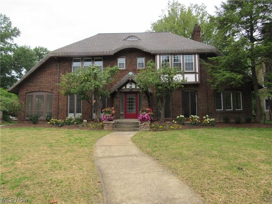 Stately Brick Tudor Inspired Colonial, brought back to its original splendor! Architectural integrity maintained while adding today’s updates! Grand Living Room w/ slate fireplace has floor-to-ceiling French doors! Delightful Sunroom w/ windows surrounding the perimeter & restored tile floor become an extension of the Living Room. Stunning Formal Dining Room w/ paneled walls & soaring windows. Step onto the screened-in Porch complete w/ stained wood plank ceiling; an inviting retreat to enjoy the night air. Kitchen bridges past w/ the present; includes SS appliances, granite, large island & pantry, plus custom butcher block, constructed w/ repurposed wood that adds such a great touch! The cozy Breakfast room w/ a bay window makes a great addition to the Kitchen! Wonderful Master Suite w/ ample storage & gorgeous Bath featuring double sinks, heated tile floor, & huge rain shower w/ a custom glass wall. 3 additional bedrooms, a Full Bath & convenient 2nd floor laundry w/ included LG wash