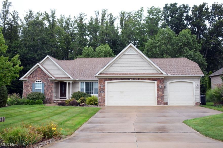 Beautiful landscaping and stone accents greet you at this meticulously maintained Ranch in the beautiful Summerwood development / Open floor plan joins the Living Rm-Breakfast area- Dining Rm and Kitchen breakfast bar all together with cathedral ceilings and wood flooring / Gas FP in Living Rm / All appliances included / Two bedrooms separated from Owners suite with glamour bath-soaking tub and shower / Large laundry room -washer and dryer included / Large finished basement area with laminate floors and adjoining full bath / Plenty of room left for workshop -fitness room - office / Large deck with trellis overlooks lush landscaping and wooded area / Shed