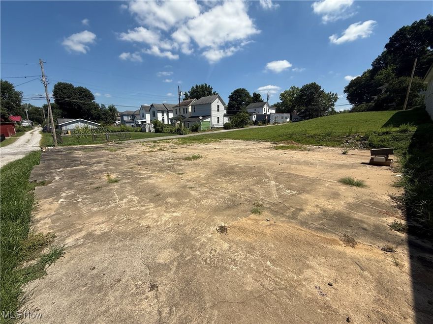 Vacant lot in Parkersburg! This cleared property at 640 14th Street offers a solid concrete pad and utility access, making it a great site for your next build or investment. Conveniently located near town amenities with alley access and open space, this lot provides plenty of potential for residential or storage use.