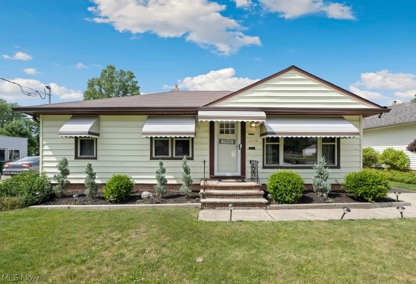 This beautifully updated Parma Heights ranch on a tree-lined street is ready for you to call home! A spacious living room with built-ins leads into a dining area, just off of the updated kitchen - featuring stainless steel appliances, new flooring, and shaker cabinets to add tons of storage. Down the hall, three bedrooms offer hardwood floors and deep closets. The updated full bathroom completes the main level. The lower level is partially finished for even more living space, with a separate second bathroom housed within a workshop and utility area, and a laundry room with plenty of space for storage. Outside, entertain on the stone patio in the summer sun. The detached two car garage and shed keep lawn equipment out of sight, and the deep partially fenced yard is just waiting for you to relax and enjoy. Turn-key and moments from Tri-C, shopping and dining, and easy access to I-71, I-480, and I-77. Don't miss this one, schedule a private showing today!