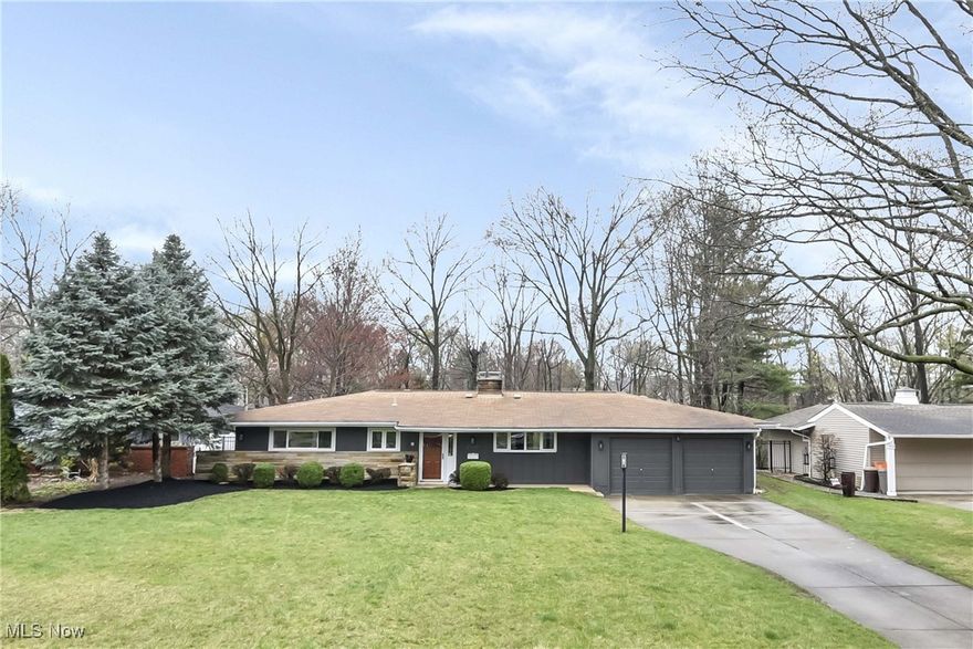 Meticulously maintained ranch that sits on a half acre, wooded lot! Beautifully done home that has a row of windows
offering great views of the gorgeous yard that extends beyond fencing to a picturesque ravine. Hardwoods flow as you relax with high a high beamed ceiling & gas fireplace. The kitchen offers Corian countertops and custom cabinetry with plenty of storage.
The dining room which is open from the living room features picturesque views and sliding glass doors that lead to the spacious
patio. The master bedroom has it's own full  bath and the two additional bedrooms that are serviced by an updated hall bath. The attached 2 car garage offers ample storage and offers two entrances into the home. One leads into the kitchen & one leads directly into the spacious laundry room.  HVAC 2018 - HWT 2022 - Dishwasher/Washer/Dryer 2021 - Brand new carpeting - The Timberdoodle Buffet Cabinet conveys. (All information is estimated to be accurate) Do not miss!