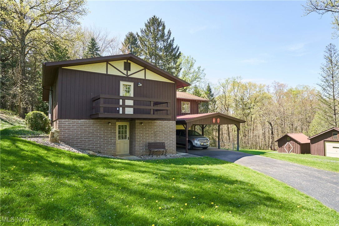Discover a rare opportunity to own 8.27 breathtaking acres in Richfield, Ohio. This secluded property boasts a harmonious blend of native trees, meandering creeks, and expansive open prairie, offering a serene backdrop for your dream home or private retreat.
The existing 3-bedroom ranch provides a comfortable living space, complemented by two versatile sheds, perfect for storage or workshop use. Whether you envision renovating the current home, building anew, or simply enjoying the untouched natural beauty, this property offers endless possibilities. Situated within the esteemed Revere Local School District, the location combines tranquility with convenience. You're just minutes away from major highways, ensuring easy access to both Akron and Cleveland. Outdoor enthusiasts will appreciate the proximity to Cuyahoga Valley National Park, offering hiking, biking, and scenic vistas.
Don't miss this unique chance to own a piece of Richfield's natural splendor. Explore the potential and make this rare property your own!