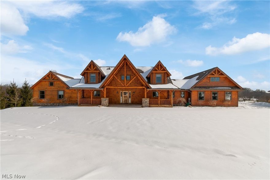 Where peaceful seclusion is paired with elevated luxury! This private sanctuary was designed for everyday living for the discerning homeowner. A 5,000 square foot retreat offering three distinct levels of living and thoughtful design throughout. The 1/4 mile driveway leads you to the most breathtaking views of the home and its surrounding 6 acres of land. Once inside, your eyes will immediately take you to the 26' ceiling accented with a stone fireplace. Every space shows off an amazing view of the property including the 44' back porch overlooking the pool area and the rolling land. The owner's wing was a recent addition, giving 1,000 square feet more to the original plan. This space offers a California closet, spa- style bath, plus the 4th bedroom which the owners use as a home office. The kitchen is complete with an antiqued copper sink, hickory cabinets, and leathered granite. A walk-in pantry is adjacent along with a guest bath, and laundry/mudroom with a large shower perfect for a dog-washing station. The second floor is a quiet space providing you two more bedrooms, a full bath, and large open loft. Multiple levels can be used for entertaining including the walk-out lower level featuring a 3rd full bath, family room, workout area, and wine making room with attached wine cellar. The outside amenities are equally as impressive! You'll find 2 acres of heavy-duty fenced area perfect for horses and the 24x38 detached garage would be ideal to convert to stables. Saving the best for last, the signature feature is the pool and outdoor living area. Added in 2023, the resort-style pool with stone hardscape was upgraded with a copper ion filtration system, expansive patio area, and serving station with water, dry storage, and a fridge. With mindful details throughout, this is a home designed for the life you've always dreamed of.