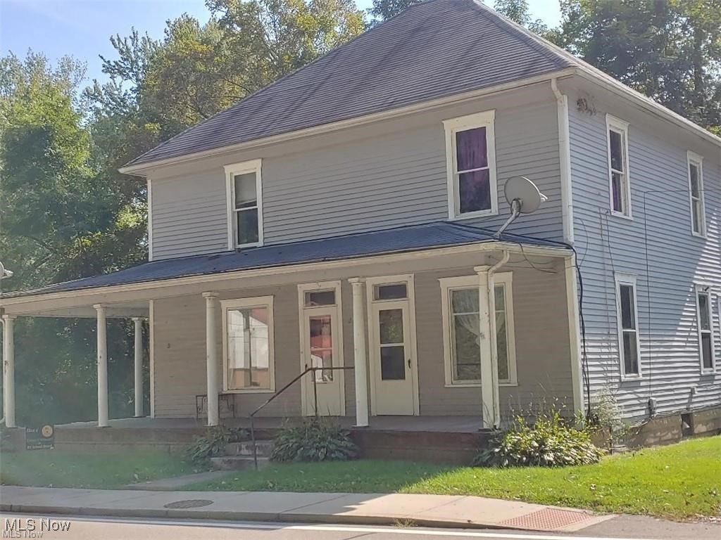 Large home with lots of possibilities. situated on 3 lots with a 4 car garage and with river frontage.