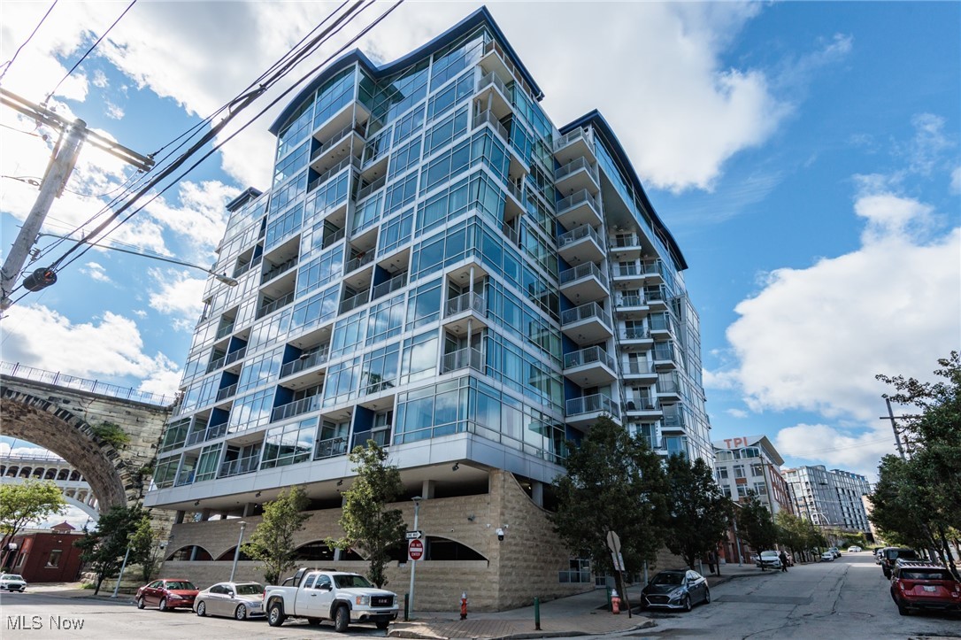Breathtaking two-story penthouse featuring dramatic views of the downtown skyline and river. Enjoy entertaining in the open concept main level. The two-story great room boasts floor-to-ceiling windows and access to the balcony. The open kitchen offers all stainless steel appliances, including two beverage refrigerators and granite counters. There is a guest bedroom and a full bath also on this level. Head upstairs to an expansive bonus space that leads you out to the private roof deck, where you can enjoy some fresh air and more spectacular views. Continuing on this level to the primary suite offering two closets with custom built-ins, and a primary bath with a spacious tile walk-in shower and double sink vanity. Two covered parking spots are included with this unit. Just minutes to downtown, hospitals, universities, dining, shopping, and entertainment. Fair housing accommodations and modifications for persons with disabilities will be considered on a case-by-case basis in accordance with the fair housing laws. Also available for sale MLS#: 5153706
