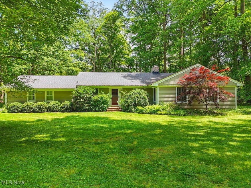 Tucked at the end of a quiet lane in one of Gates Mills’ most coveted enclaves, 463 Overlook lives up to its name—perched above the Chagrin River with excellent views and foliage. Surrounded by mature landscaping and the peaceful backdrop of nature, this charming 4-bedroom, 3-bathroom ranch is a rare combination of serene setting and timeless charm. The home blends gracefully into its surroundings, clad in durable Hardie Plank siding and updated Pella windows that frame the scenic beauty from every room. Inside, hardwood floors flow throughout a sun-filled, open layout design. Newer master addition is a true retreat—spacious with an expansive en-suite bath featuring dual vanities, a soaking tub, and a custom walk-in closet with built-in organization. Three additional bedrooms share two full baths, perfect for guests or family. Elements have been thoughtfully upgraded, including furnace and water treatment system (Kinetico), refrigerator and dishwasher, dehumidifier, sump pump, and AC/heater in the garage. New plantation shutters add elegance and function. Whether sipping morning coffee on the patio or enjoying an evening under the stars, this property invites you to slow down and enjoy the magic of life in Gates Mills. Schedule a tour today!!