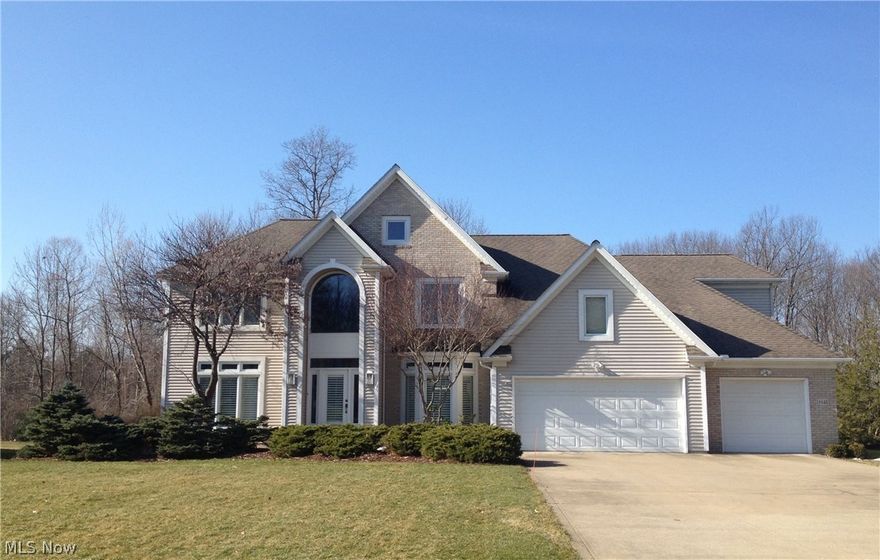 Welcome home to this stunning custom-built one owner home. Enter the beautiful two-story foyer that opens to your living room with crown molding and plantation shutters. The formal bayed dining room offers a tray ceiling, pillars and plantation shutters. Relax or entertain in the open and bright two-story family room with full window walls, gas fireplace and custom mantle. There is a first-floor den/office with bay windows. The chefs kitchen offers newer stainless steel appliances, granite countertops, breakfast bar, center island and spacious eating area. There is also a first-floor mudroom and laundry room. The nicely appointed master suite offers vaulted ceiling's, bay window walls and oversized walk-in closet. The glamour bath features double sinks, whirlpool tub and seperate shower. There are three additional large bedrooms on the second floor. The home is neutral through out with many custom upgrades. This beautiful home offers a finished lower level with a rec room, office and f