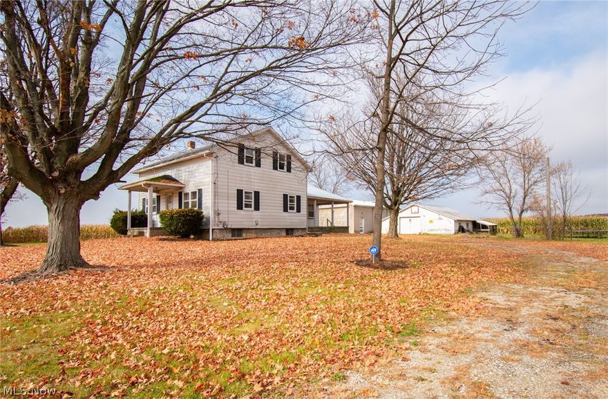 AWESOME 3 Bedroom, 1 & 1/2 Bath Home with 2 Huge Outbuildings on 2 (est.) acres of land.  Home Features Include:  Large Front Living Room, MASSIVE Family Room, HUGE Eat In Kitchen with tons of cabinet space, & 1/2 Bath.  Second Floor offers 3 Large Bedrooms & Full Bath.  The Large Dry Basement is perfect for your Rec. Room.  The 80 x 40  & 38 x 24 Outbuildings are perfect for your car enthusiast or for tons of storage.  Electric has been updated.