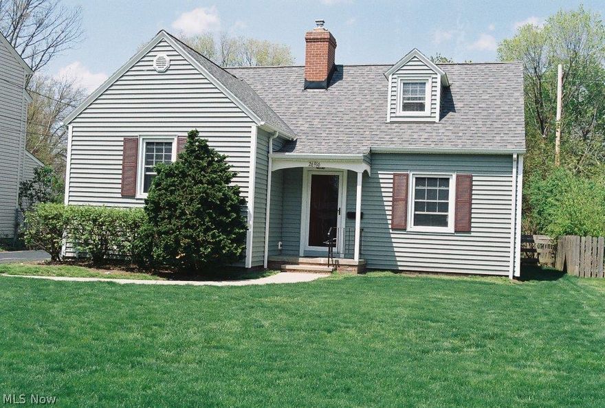 Charming 3/4 bedroom cape cod. WBFP in living room and gas fireplace in family room. Neutral décor throughout. Hardwood floors and new carpet in many rooms. Newer windows, 2 car garage in 2002. Large lot (50x183). All appliances stay (dishwasher not working). 3 season room (enclosed porch) and a large deck. 2 streets south of Lake Rd.  Close to schools and Huntington Beach.