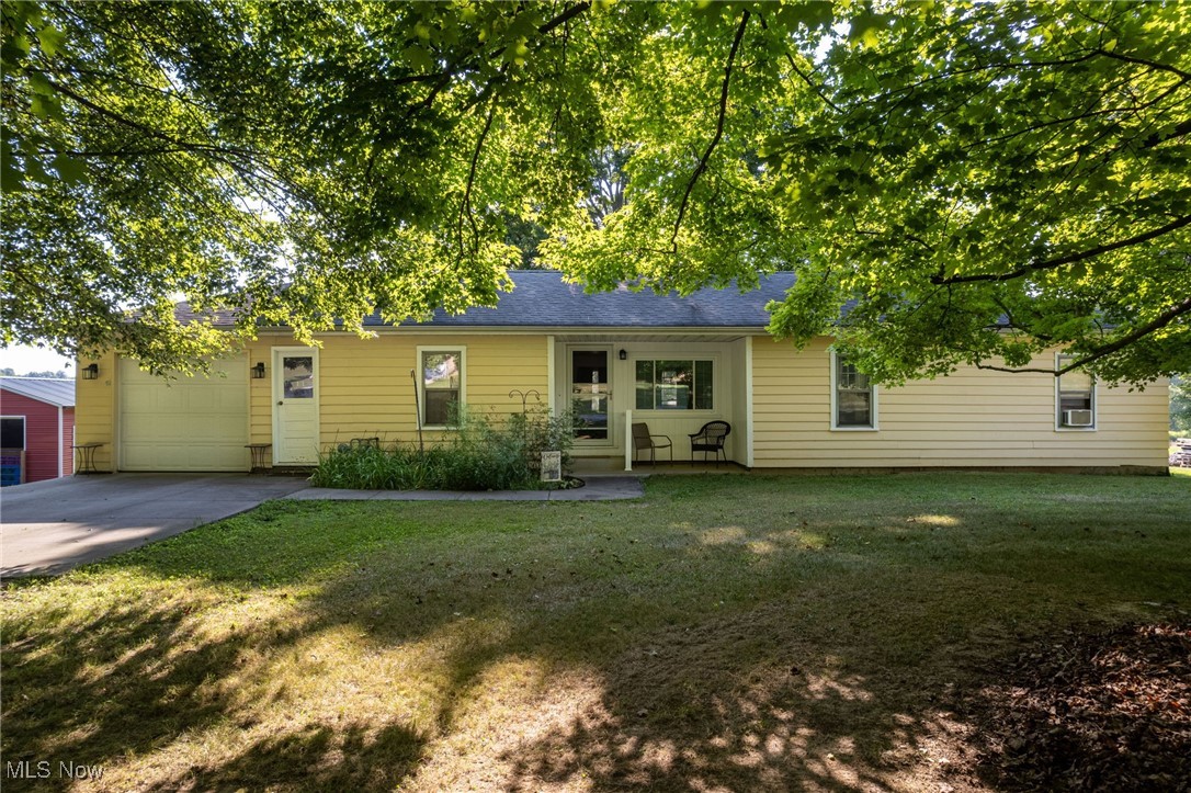 Rare find in Highland Schools at this price point! This beautiful piece of land includes almost 3 acres and is already fenced for pasture and has a 2 stall barn ready for your horses or hobby farm! The home itself is a 3 bed, 1 full bath ranch, with original hardwood floors throughout. There is also an attached 1 car garage. This one is ready for your personal touches, call today for your private tour!