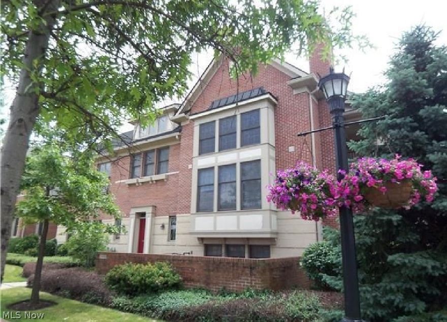 Spectacular Townhouse in Sussex Courts almost 3,500 sf!! Gorgeous Two Story Great Room with gas fireplace, boxed bay window and floor to ceiling windows! Fabulous Gourmet Kitchen with maple cabinets, high-end stainless steel appliances, granite countertops, tiled backsplash and separate eating area!  Large Elegant Dining Room makes this home great for entertaining! Spacious Master Suite with large custom closets & gorgeous master bath with double sinks, jetted tub & separate shower!! The Master Suite also has doors to a large private covered balcony that overlooks the courtyard!  2nd level also includes two additional bedrooms with jack and jill bath and loft overlooking the Great Room!! Washer and dryer are conveniently located on 2nd level!! The Fabulous Walk-Out Lower Level includes a Family/Media Room with hardwood floors, fireplace, large wet bar and there is also a 4th bedroom and full bath! Wonderful updates include: 9' ceilings, hardwood floors throughout entire 1st floor & low