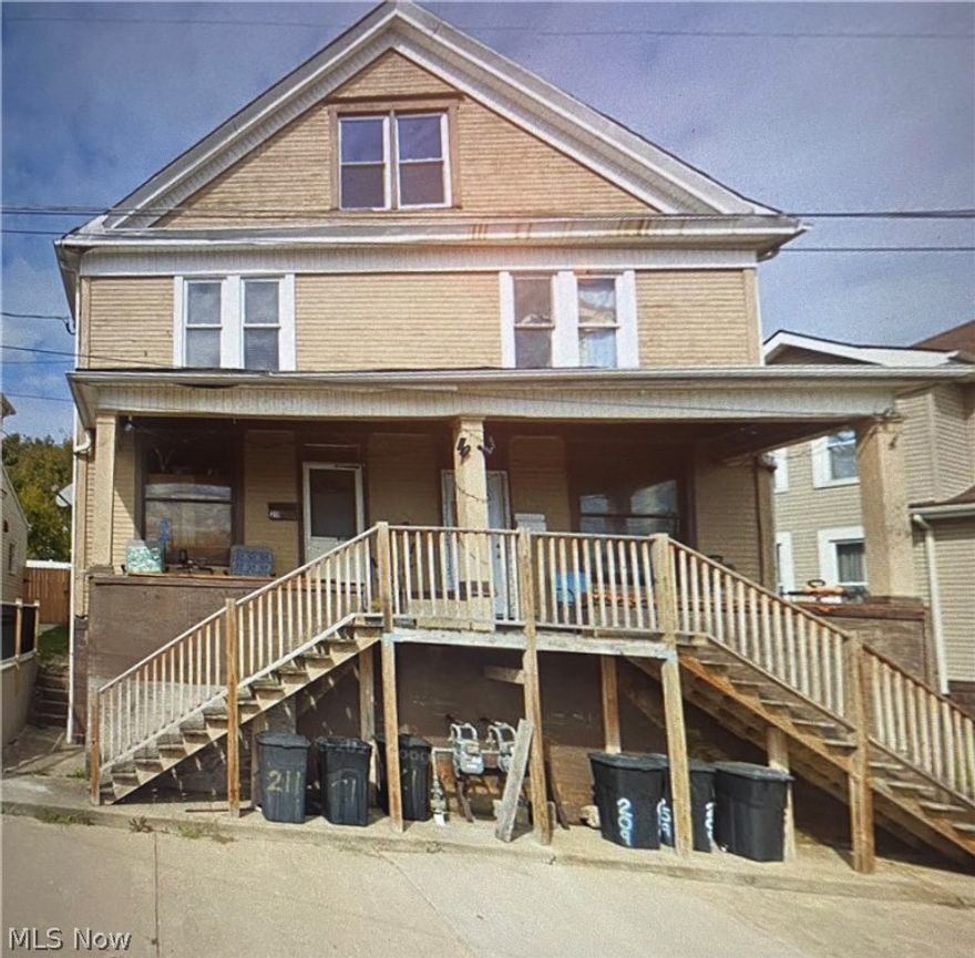 Spacious side by side duplex .. each side features a living room, formal dining room, large kitchen and 1/2 of the basement.  Convenient location in Martins Ferry Ohio.  Each side rents for $650.00  each plus each unit pays 35 dollars a month to cover the water bill.   The gas and electric are paid by the tenants.