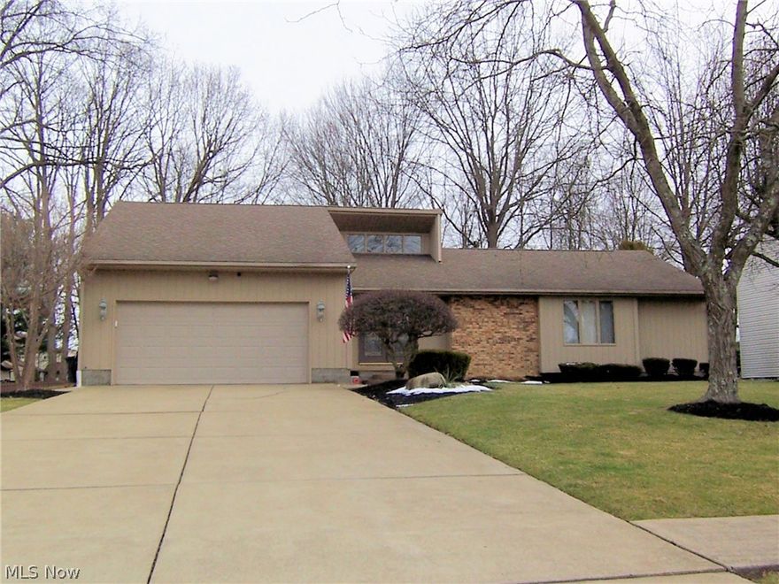 Beautiful updated 3/4 bedroom Gene Russo built ranch style home is located in one of the nicest and more accessable neighborhoods in Niles, Ohio.  Many updates including the incredible hardwood flooring in the living room, foyer and main floor bedrooms.  The kitchen features updated cabinets, granite counters and backsplash and stainless appliance.  The living room is large and features a fireplace (burn wood or use gas, your choice) and plenty of sunshine!  The incredible family room is located off the kitchen eating area.  This room will become your favorite for entertaining or just lounging.  Its 36x20 and includes several skylights and ceramic flooring.  There are 3 bedrooms and 2 full baths included on the first floor.  The owner's suite is 19x14 with hardwood flooring and its own full bath.  Off the family room you will see the large stamped concrete patio.  The rear yard has a few more surprises including a shed, barn, several areas set up for gathering and a pizza oven! The low