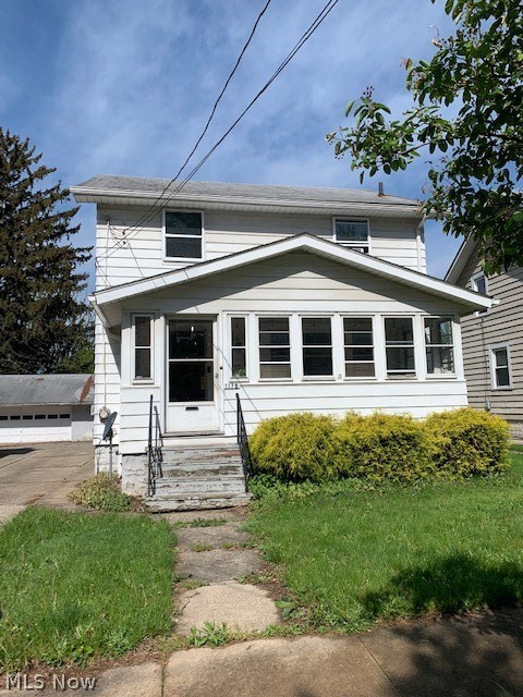 Come visit this spacious colonial on a popular street in North Hill! Very well maintained home has 3 bedrooms, a dining room off the kitchen and a 2 car garage.
Enjoy a cup of coffee in the sunny front enclosed porch. Wood floors throughout much of the home, with updated laminate on other parts. The furnace and water tank are both newer and the electric is updated. There is an older full bathroom in the basement that is semi closed in. With some extra touches, you could have another living area in the basement. The garage is attached to the neighbor garage, and the driveways are side by side, not shared. Please give ample notice. Tenant occupied so please give 24 hour notice before any showings.