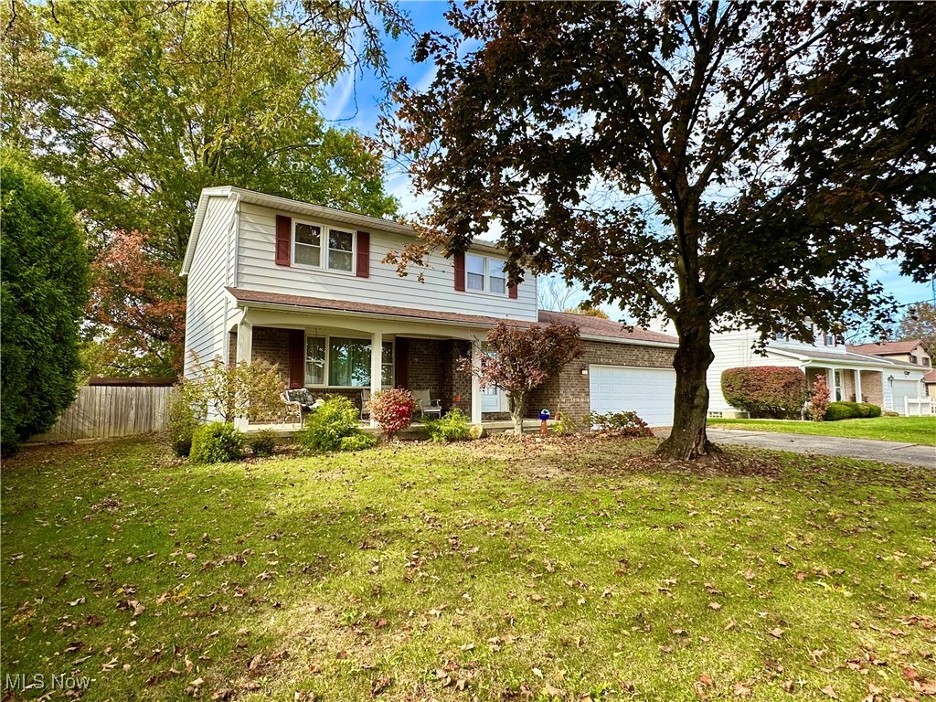 This traditional two-story home has so much to offer! One-family owned, it has been lovingly maintained over the years and it shows. Step inside to find a beautiful staircase leading upstairs to three oversized bedrooms, each with walk-in closets. The primary bedroom also has an attached full bath. The guest bath offers dual sinks and a tub/shower combo. Back on the main floor, the spacious living room features crown molding and elegant oak trim. The dining room flows into the fully equipped kitchen, while the fireplace is the focal point of the cozy family room. It boasts a brand-new sliding glass door with upgraded slim shades inside. The door leads out to the massive fenced-in yard featuring a shed and a large spotlight, allowing the kids to play all night long! The full basement is immaculate with built-in wood shelving and a dedicated laundry area. Plus, the screen doors, windows, and HVAC have all been recently replaced. Best of all, this home is located in a friendly Austintown township neighborhood close to shopping, dining and recreation. Put this on your MUST SEE list!