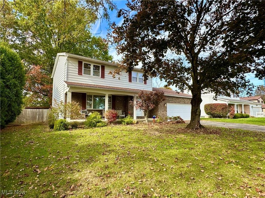This traditional two-story home has so much to offer! One-family owned, it has been lovingly maintained over the years and it shows. Step inside to find a beautiful staircase leading upstairs to three oversized bedrooms, each with walk-in closets. The primary bedroom also has an attached full bath. The guest bath offers dual sinks and a tub/shower combo. Back on the main floor, the spacious living room features crown molding and elegant oak trim. The dining room flows into the fully equipped kitchen, while the fireplace is the focal point of the cozy family room. It boasts a brand-new sliding glass door with upgraded slim shades inside. The door leads out to the massive fenced-in yard featuring a shed and a large spotlight, allowing the kids to play all night long! The full basement is immaculate with built-in wood shelving and a dedicated laundry area. Plus, the screen doors, windows, and HVAC have all been recently replaced. Best of all, this home is located in a friendly Austintown township neighborhood close to shopping, dining and recreation. Put this on your MUST SEE list!