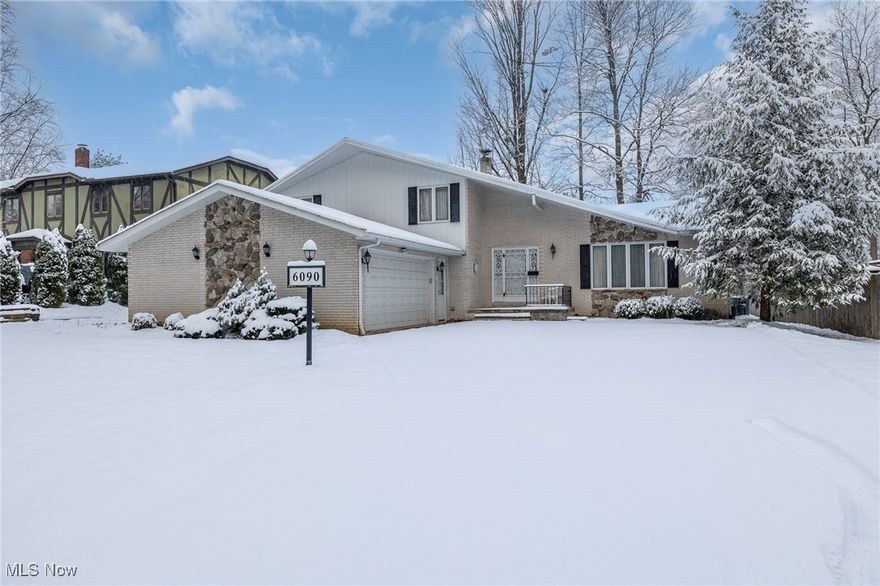 This executive home has all the bells and whistles, custom built by Fragapane Homes. Beautiful open floor plan. First floor has a oversized living room, dining room, and eat in kitchen. Brick fireplace in family room has heatilator that can be seen from the kitchen as well as wet bar. Three full baths including en-suite in oversized owner's suite with sit down vanity. Owner's suite also has a walk in closet as well as two additional closets. Four full bedrooms, three on second floor, one on lower level which is level with the garage entry, family room, full bathroom and laundry room. Walk out paver patio from the family room leads to a beautiful scenic backyard. Home also has a finished basement with summer kitchen in the rec room as well as wine cellar. Looking out your front window you have the scenic Big Creek Parkway views with walking and bike trails. Put your decorating touches on this beautiful brick home with Pella windows on the parkway.