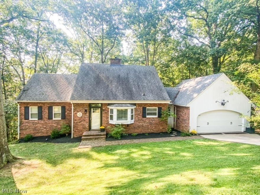 Here's your chance to buy your own HGTV-worthy home! This lovely 4 bedroom, 2 bath brick cape-cod is conveniently located in Woodland Park and is situated on a beautifully wooded half acre lot. This tastefully upgraded home feels like you're living on vacation with wooded views throughout and plenty of places to relax with your morning coffee. First floor living is possible with the spacious master, full bath, large kitchen, living room with dining room and laundry on the first floor. Walk out to the inviting covered porch which leads to a deck overlooking this maintenance free backyard and custom built 2-story tree house with electric! Upstairs you have 3 additional bedrooms, full bath and storage space. The walkout basement has a lovely family room, rec room and an unfinished space being used as a workout room! Words truly don't do justice for this beautifully remodeled home! Call today for your personal tour!!