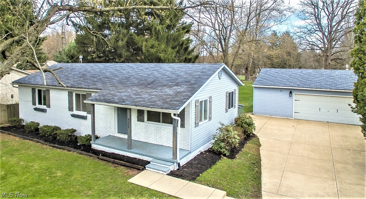 * MODERN Perfectly REMODELED Ranch One Floor Living W/3 Bdrms, 1.5 Bathrms, 2.5 Car Garage & .40 Acres! *Great Curb Appeal ~ A White Picket Fence In Front, White Brick Front Exterior, Grey Custom Shutters, COVERED Front Porch W/Custom Grey Columns & Wide Concrete Driveway! *Newly Stained DECK And FENCED IN YARD! *Shed W/New Doors, Same Color Scheme As Garage AND Home *Updates Include: New LUXURY Grey Distressed Plank Flooring Throughout The Entire First Floor *Brand New Kitchen White Arcadia Shaker CABINETS W/Oversized Stainless Hardware, BUTCHER BLOCK Countertops, Stainless Steel Appliances, Two Triple Glass Jar Nickel Flushmount Lights & Matching Above Sink Pendant Light W/Edison Bulbs & Subway TILE BACKSPLASH! *Brand New Full Bathrm W/SHIPLAPPED WALLS, Triple Sconce Jar Lighting, Brown BARN DOOR Vanity W/Black Accent Handles, Sink, Black Accent Circle Farmhouse Style Mirror, Shower W/Dual Handheld & Regular Showerhead, New Tub, Surround And More! *New Half Bathrm W/BARN DOOR Vanity,