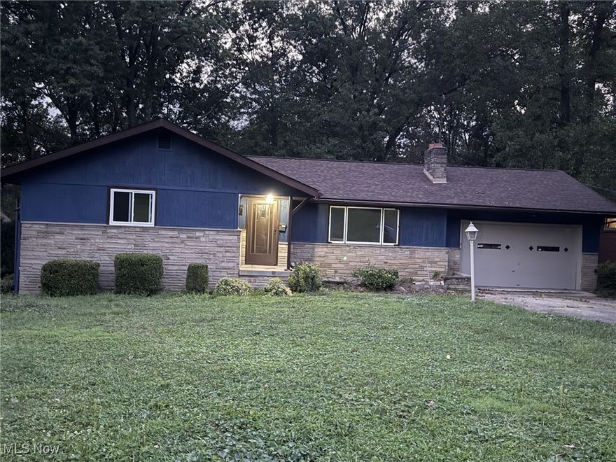 This charming single family ranch home is located at 820 Hartzell Avenue in Niles, OH…resting directly across from Stephen’s park.  This home was built in 1966 and boasts a classic design with modern updates. With a total of 2 fireplaces, 2 finished bathrooms this ranch features a 2 story deck, a highlight with a patio underneath. This ranch home offers ample living space for family and guests with a finished basement providing plenty of room for comfortable living. The lot size is generous offering a spacious yard for outdoor activities and entertaining. The property is well-maintained and features a lovely exterior with curb appeal. Inside the home is bright and welcoming, with tasteful finishes and plenty of natural light. The layout is functionable with the kitchen is the heart of this house, offering a seamless flow down to the basement with barn wood finishes.  The home is perfect for those seeking a peaceful retreat in a recommendable neighborhood. Don't miss the opportunity to make this delightful property your own!.