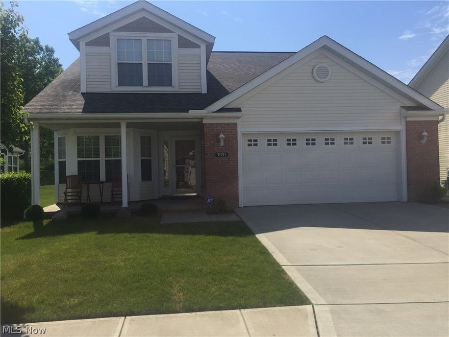 Beautiful, significantly upgraded 3 bedroom, 2 full bath dream home in lovely Woodland Pointe development close to shopping and highway. NO lawn mower needed as the HOA takes care of all landscaping (including mulch) AND snow removal. TOO MANY UPGRADES TO LIST SO YOU MUST SEE THE HOME IN PERSON!! Spend time reading paper and having coffee on the spacious front porch. First floor master has vaulted ceilings, spacious walk-in closet, and private bathroom with soaking tub and separate shower. Spacious foyer, 2nd bedroom, guest bathroom, and laundry room are also on the first floor. Upstairs features spacious 3rd bedroom and a separate loft that is currently used as a media room. The eat-in kitchen in very spacious and has ceramic flooring, maple cabinets, and new stainless steel appliances. There is an awesome fireplace to keep warm in the winter, a spacious stone patio for entertaining, and a sizable backyard with wooded view. There are walk-in storage rooms with shelving on 1st and 2nd