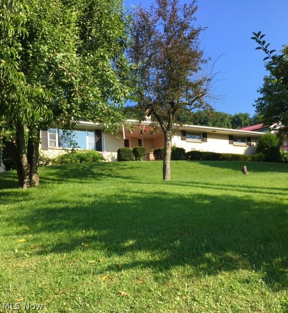 BEAUTIFUL BRICK HOME IN COUNTRY-LIKE SETTING. OWNERS HAVE HAD HOME FRESHLY PAINTED INSIDE & MAKING ELECTRICAL UPDATES TO THIS 4 BEDROOM, 2.5 BATH HOME CLOSE TO TORONTO SCHOOLS & ROUTE 7. THIS HOME HAS SO MUCH TO OFFER - BEAUTIFUL STONE FIREPLACE, 2 CAR ATTACHED GARAGE, LOADS OF STORAGE. WORKSHOP & LAUNDRY IN BASEMENT & GREAT VIEWS. FEELING LIKE YOU NEED ROOM TO BREATHE, CALL TODAY.