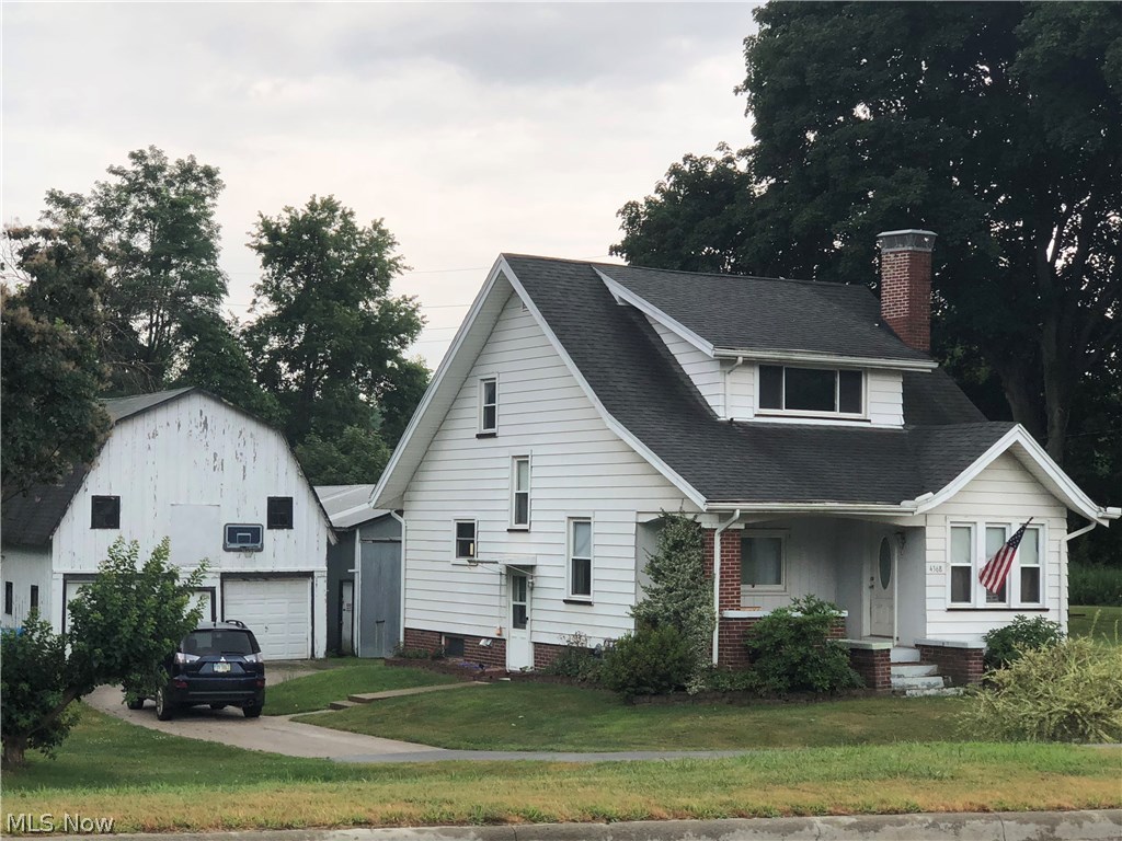 Don't miss out on this Cape Cod situated on 1.74 Acres and includes a large 40 X 22 Metal building that will hold at least 4 cars. There is also a barn with a loft but barn needs some work. There are 3 large bedrooms, full bath up and 1/2 bath on main floor. There is a full basement with a walk-out. Many up-dates include new windows, new roof in 09, new hot water tank in 12, new furnace & cent. air in 17 and new septic pump in dry well. There is a list at the home of the up-dates and completion dates. There is an easement with the phone co.. for a building and they pay $500 yr. for maintaining the lawn around the building. Ready for a new family.
