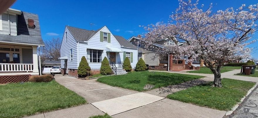 Aluminum Sided Bungalow, 3 bedrooms, 2 baths, eat-in kitchen, all appliances stay, hardwood floors, newer furnace, rec room, shed, 2 car garage w/opener