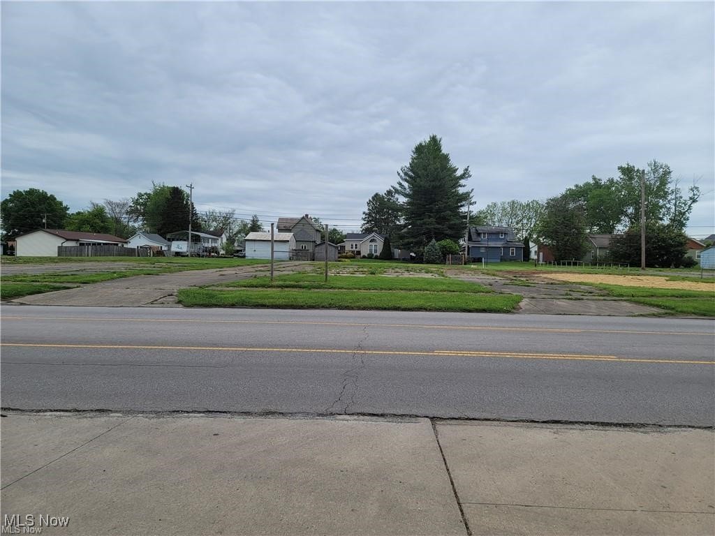 Wonderful large commercial land. .997 acres +/- It is a total of 4 lots. Each one has gas, water, sewer and electric connections. Corner lot. Only 3 blocks from Washington Blvd. Across from Riverview Credit Union. Banks, restaurants and many other conveniences.