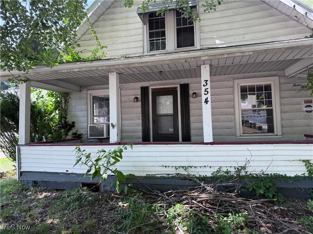 This cozy Colonial in Akron's Lookout Park subdivision near North Hill checks all the boxes! Outside features a covered front porch, detached garage and a fenced backyard. Inside, you get a kitchen, dining room, living room and a bedroom with en suite half bath. The second floor is home to the full bath and remaining bedrooms.