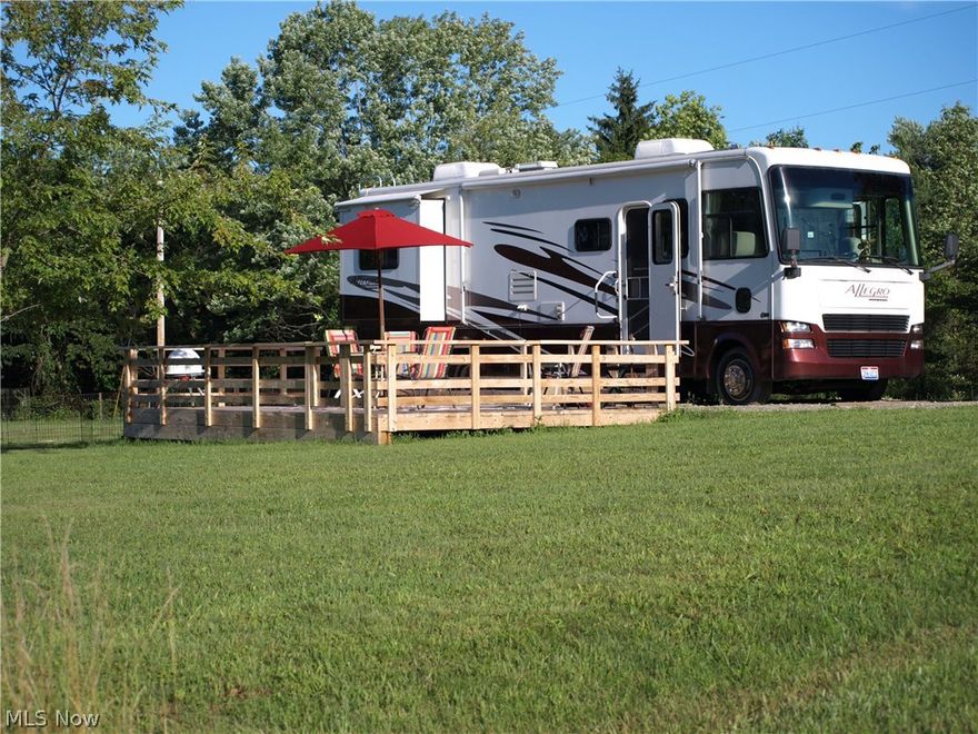 3 leveled owned lots, water and electric on site. Large deck for entertaining. Campground amenities. Call your agent for more details.