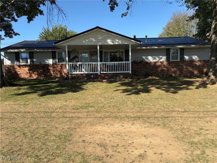 Opportunity knocking!  Come see this lovely home located on a corner 0.352 lot in a desirable neighborhood.  Immaculate inside and out, move in ready!  Be in your new home for the holidays.   Home features a beautiful front porch surrounded by mature trees and a back porch, four season room so no matter the weather there is a place to be comfortable!  Attached 2 car garage is heated and yes, there is also a detached 20x22 workshop/garage and 10x12 shed.  Three nice size bedrooms, large comfortable living room and a large tiled basement for even more living space.  Range, Fridge and microwave stay.  New metal roof 2 years ago and new Tempstar energy efficient furnace with AC and whole house humidifier 1 year ago.   Call to see this property today.  You won't be disappointed.